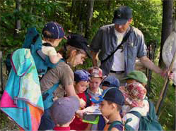 Image of children learning outdoors.